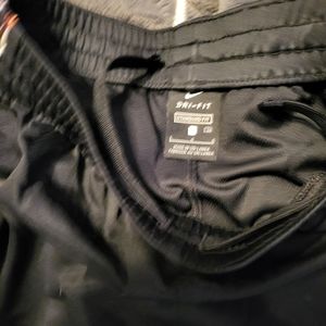 Nike Boys shorts size LG 10-12, multi color side design with pockets